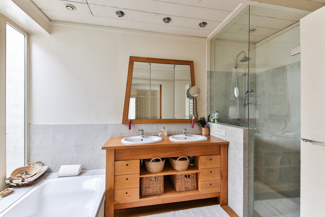 Bright modern bathroom with a walk-in shower and floating vanity